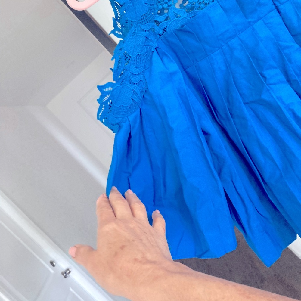 This royal blue shirt is one of a kind. Gorgeous.